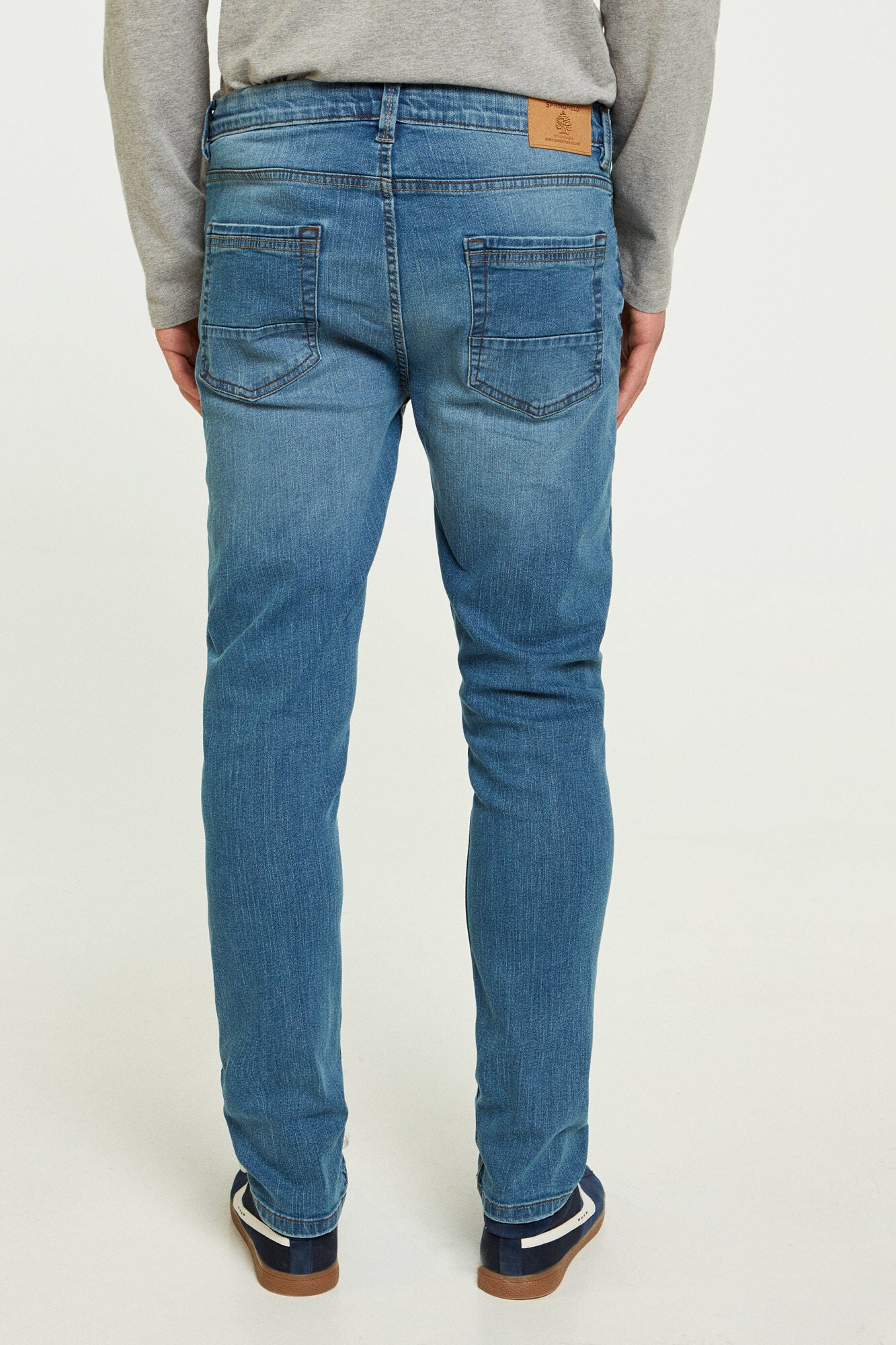 Medium wash slim fit lightweight jeans