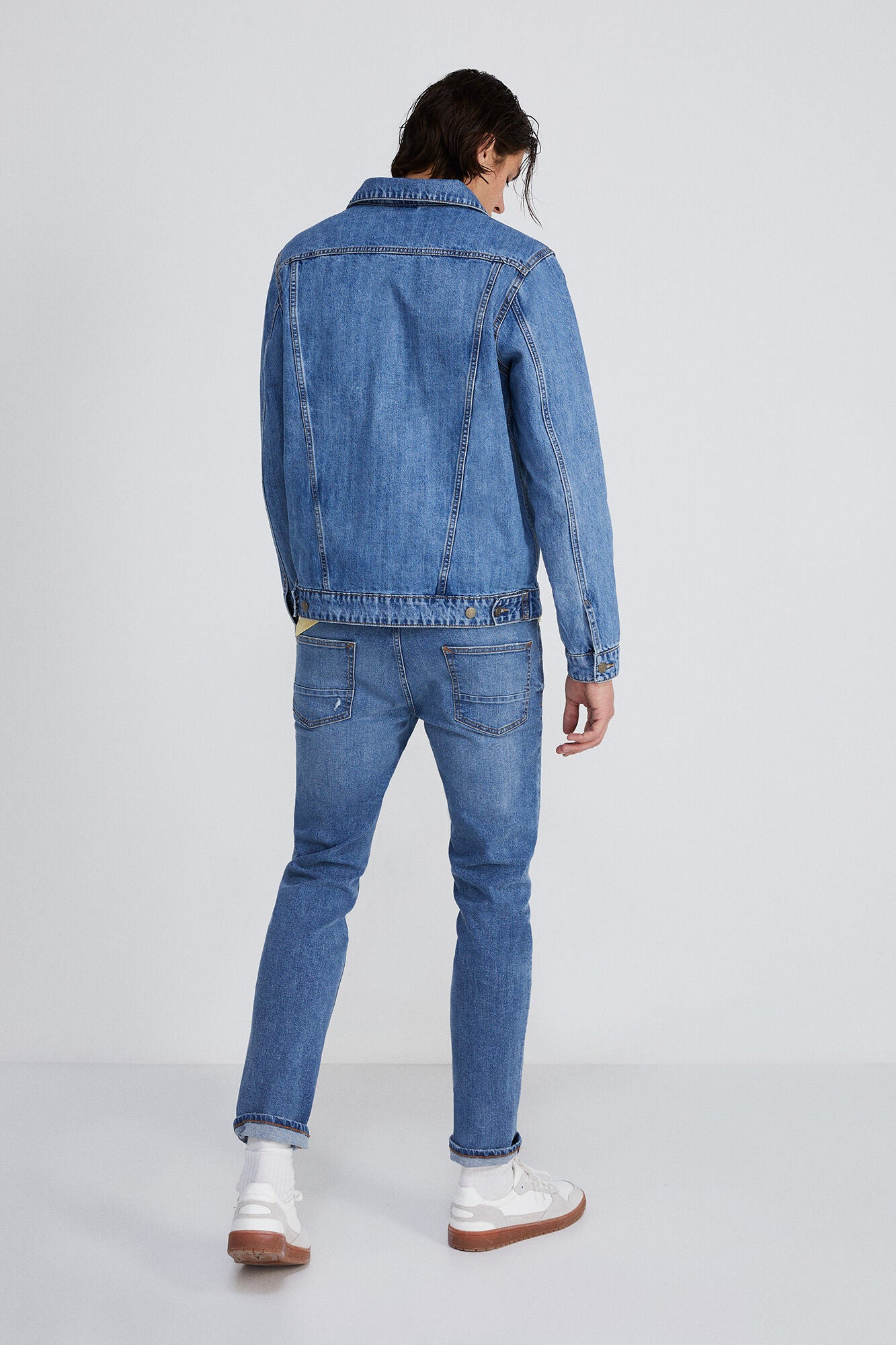 Medium wash slim fit jeans with rips